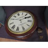 An early 20th century Railway Station style Wall Clock in mahogany case by A A Osborne and Co,
