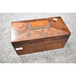 A 19th century mahogany sarcophagus-form tea caddy, with internal compartments and replacement glass