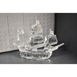 A crystal glass Swarovski figure study of the Santa Marie galleon with box