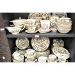 An extensive collection of Indian Tree pattern dinner and teawares, some marked for Johnson