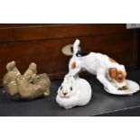 A collection of figure studies including Royal Doulton Jack Russel eating from plate, USSR Rabbit