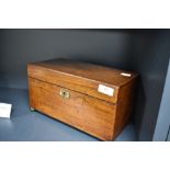 A late Victorian Rosewood tea caddy, of plain hinged rectangular form, with two internal