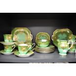 A Noritake green and gilt decorated six setting teaset, to include two side plates