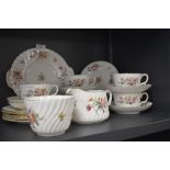 A collection of Minton Marlow S309 to include cups and saucers,sugar,creamer and plates.