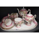 A late 19th/early 20th century breakfast or chocolate set having tray, cups and saucers, handled