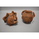 Two Ecuadorian earthen ware vessels of Grotesque design.