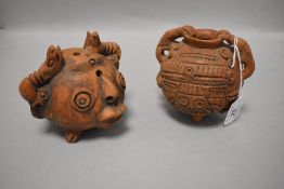 Two Ecuadorian earthen ware vessels of Grotesque design.