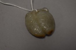 A Chinese sun jade/ natural stone carving depicting roots or similar.