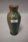 A Pilkingtons Royal Lancastrian vase, circa 1907,having mottled green and beige glaze with lilac and