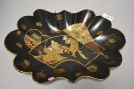 An Edo period japanese lacquer scalloped bowl decorated with scene of Samurai presenting a severed
