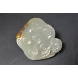A Chinese sun jade carving.