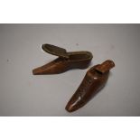 Two late Georgian carved snuff boxes in the form of boots.
