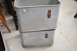 A pair of tanalised containers, possibly military foodstuff related, stamped marks to end