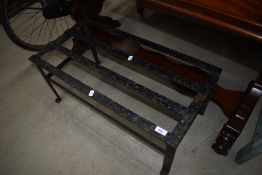 A large cast footman/trivet, width approx. 72cm