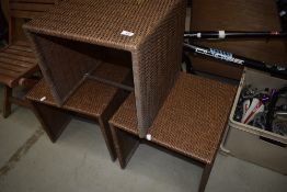 Three modern occasional tables in artificial wicker