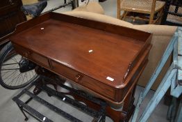 A Victorian mahogany two drawer washstand