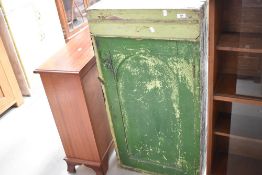 A rough painted cabinet