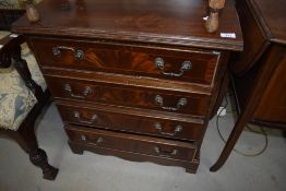 A reproduction Regency chest of four drawers