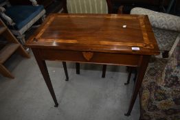 A late 19th or early 20th Century inlaid side table