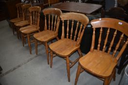 A set of six modern pine kitchen chairs on turned frames