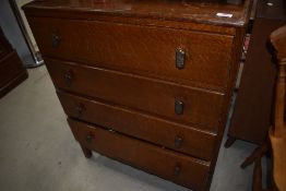 An early to mid 20th Century oak and ply four drawer bedroom chest