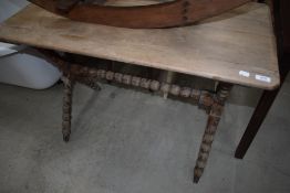 A traditional bobbin turned occasional/tavern table, width approx. 100cm