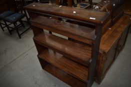 A Victorian mahogany wall shelf, in the waterfall style, width approx. 84cm