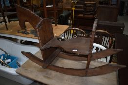 An interesting craftsman made solid frame childs rocker