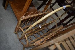 A vintage bamboo magazine rack