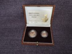 A 1989 Queen Elizabeth II Gold Britannia Two Coin Proof Set containing a 1/10 oz 10 Pound Coin and a