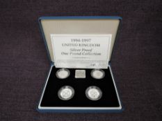 A Queen Elizabeth II 1994-1997 United Kingdom 1 Pound Silver Proof Coin Collection, in original