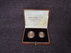 A 1988 Queen Elizabeth II Gold Britannia Two Coin Proof Set containing a 1/10 oz 10 Pound Coin and a