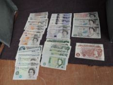 A collection of Uncirculated United Kingdom Banknotes, Ten Shillings to Fifty Pounds, face value £