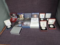 A collection of Sixteen Elizabeth II United Kingdom Five Pound Silver Proof Coins in original