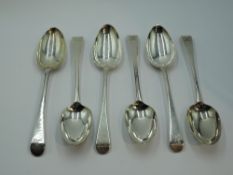 Six Georgian silver table spoons of Old English form bearing Ornithological crest to terminals,