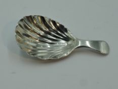 A Georgian silver caddy spoon having scallop shell bowl, William Sumner & Richard Crossley, approx