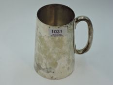 A silver tankard of plain tapered form, London 1941, Charles Kain, approx 444g (no inscription)