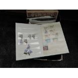 A box of World Stamps in albums, mint and used