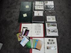A collection of GB mint Stamps, Covers and Stamp Booklets, mint stamps in two albums 1953-2006
