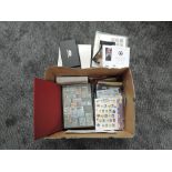 A box containing 2002 & 2007 Royal Mail Year Books, album of GB mint Stamps, Royal Mail Post