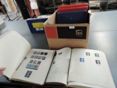 A collection of GB Stamps in 6 albums, 1977 Year Pack and Stamp Booklets, mainly Queen Elizabeth,