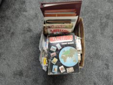 A box of World Stamps and Covers in albums and loose