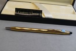 A boxed Cross Century Classic ballpoint pen in gold