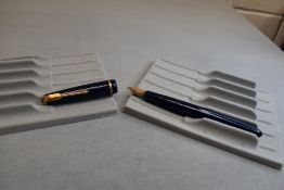 A Parker Junior fountain pen in blue with narrow decorative band to the cap and having a Parker 10 9