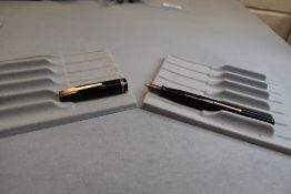 A Waterman Ideal leverfil fountain pen in black with two narrow bands to the cap having Waterman