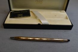 A boxed Cross Century Classic ballpoint pen in gold