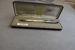 A silver plated Cross silver plated ballpoint pen bearing a pair of shoes to clip in original box