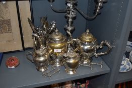 A selection of mixed silver plated wares, to include four piece teaset, three-branch candelabra,