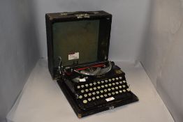 A cased vintage Imperial 'The Good Companion' typewriter