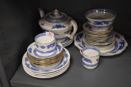 A selection of Coalport 'Dragon Series' teawares, to include teapot, sugar bowl, saucers